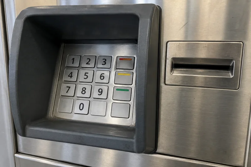 The keypad and card slot of a cash machine