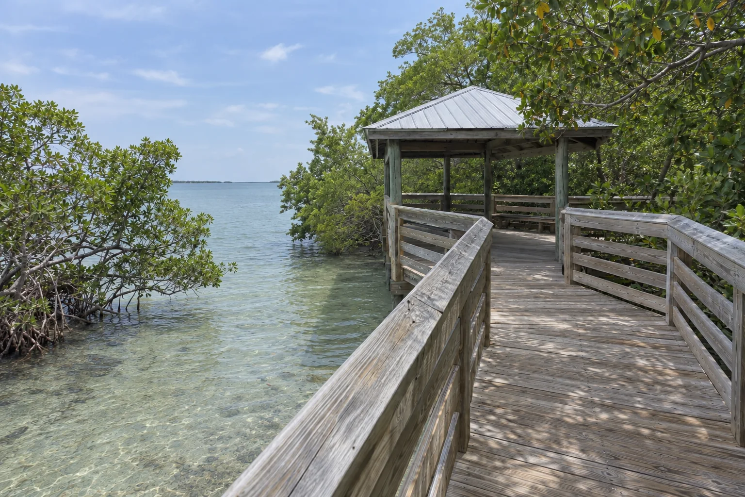 The wooden boardwalk at Anne's Beach in Islamorada beside shallow water