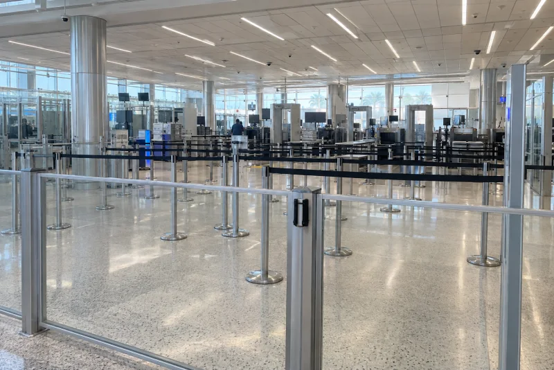 Empty queue lanes at an airport security checkpoint