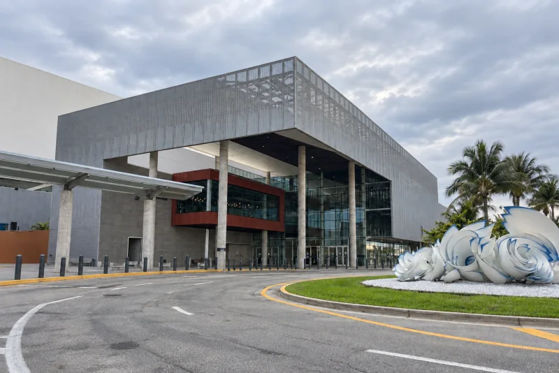 A cruise terminal building at Port Everglades in Fort Lauderdale, seen from the drop-off road