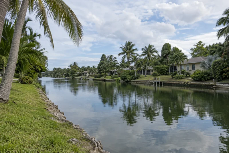 A canal in Miami Springs beside the airport